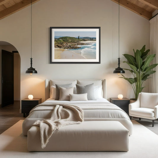 Norries Cove print in black frame hanging above bed